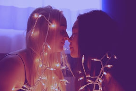 Two women kissing