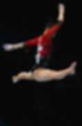 Actionbild: Spagatsprung auf dem Balken