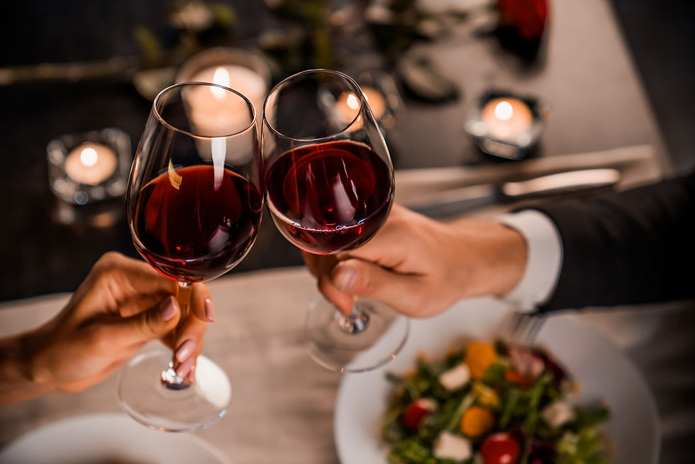 Close-up view of a candlelit dinner table set for two