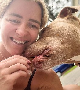 nicole-feeding-dog-waggin-waddlin-pet-care-service