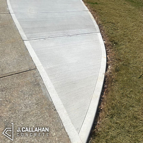 Concrete driveway extension close-up