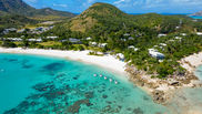 An aerial view of Lizard Island resort, beach and fringing reef