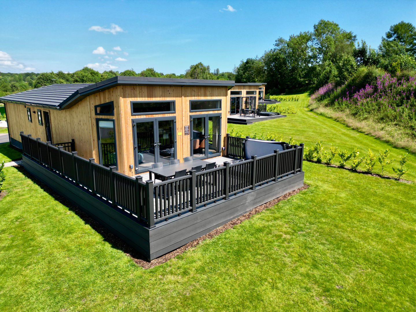 The Wentwood Lodge 3 bedroom six person luxury lodge with Hot Tub garden decking ensuite Forest of Dean Wye Valley Gloucestershire