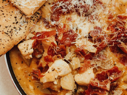 Creamy Tuscan Chicken with Crispy Prosciutto