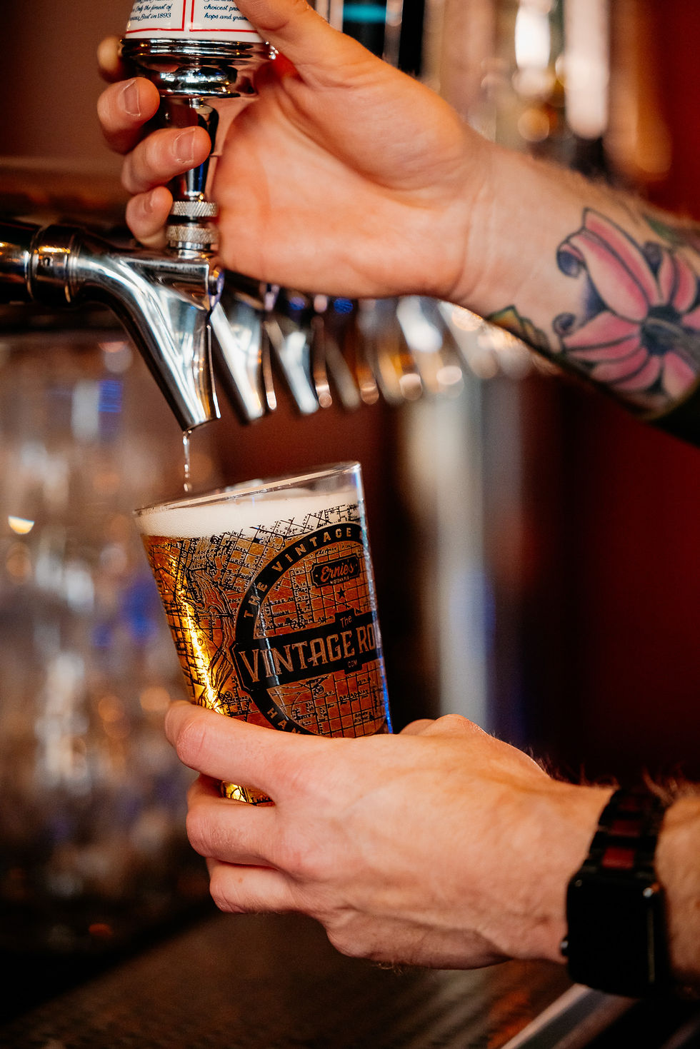 Pouring a pint of beer from the tap