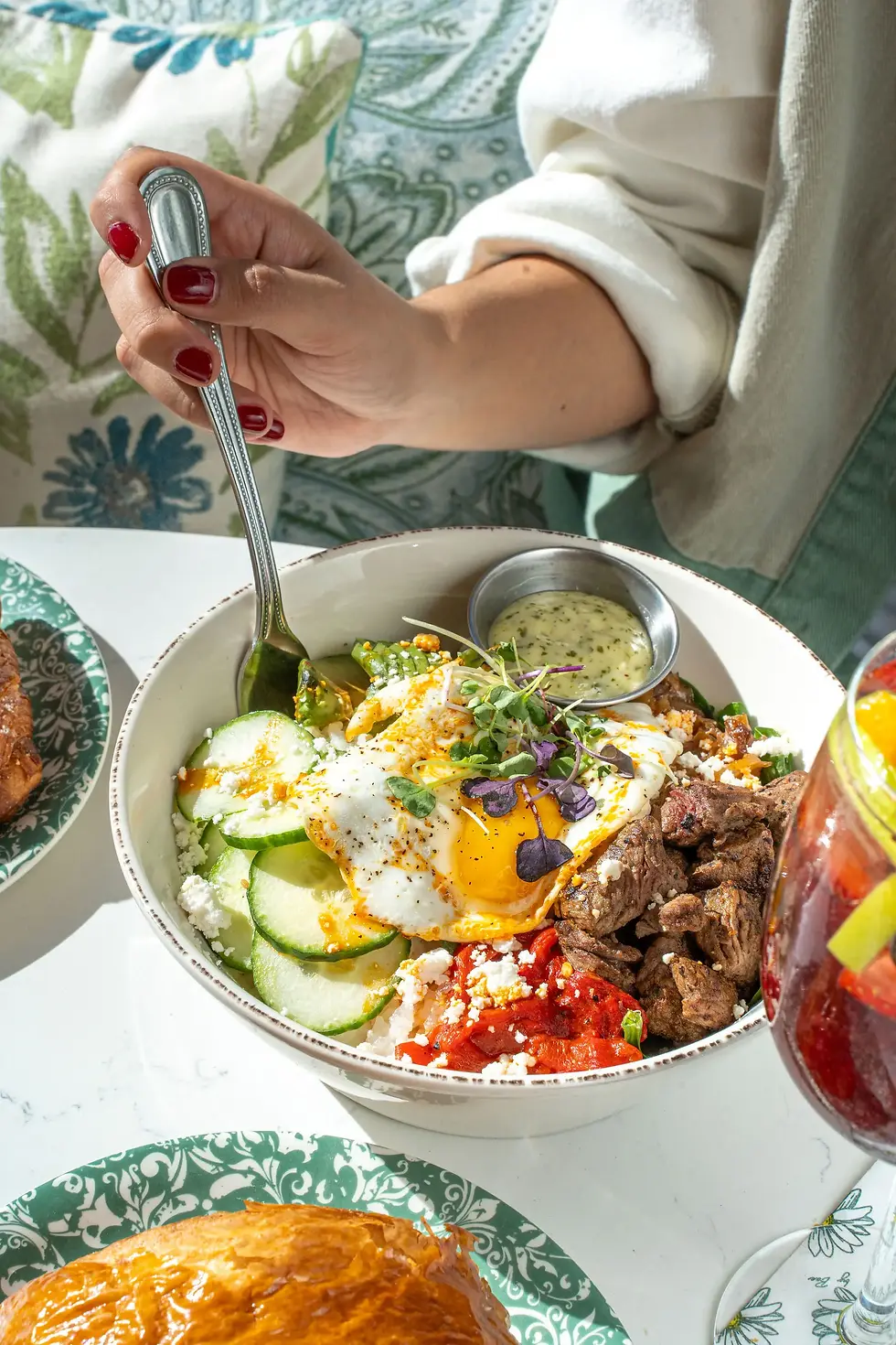 Steak and Eggs Bowl from the best brunch in Miami with sunny side eggs.
