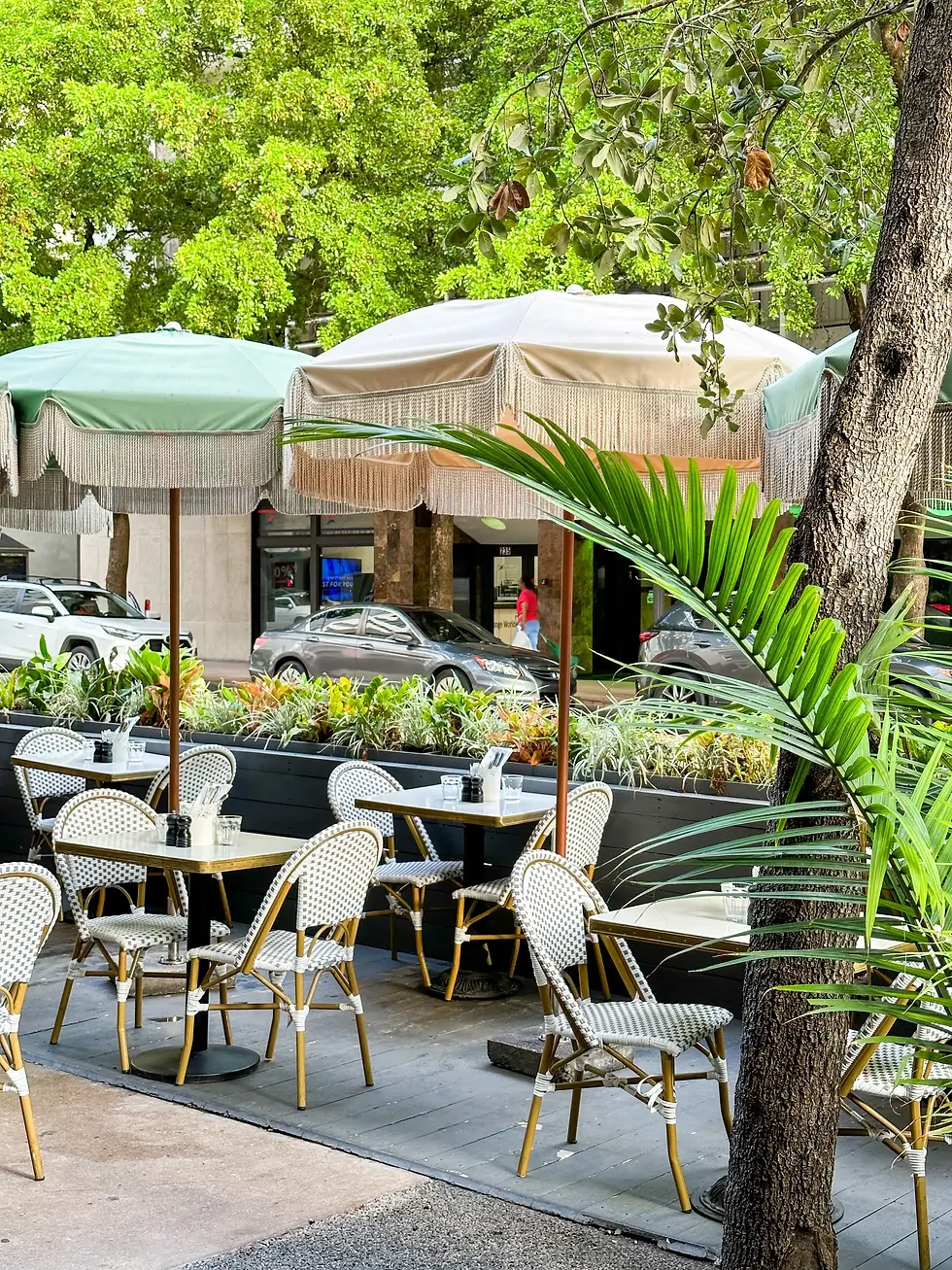 Beautiful outdoor seating at Café Bastille, offering a perfect space for group dining Miami and private events at all locations—Downtown Miami, Miami Beach, and Fort Lauderdale