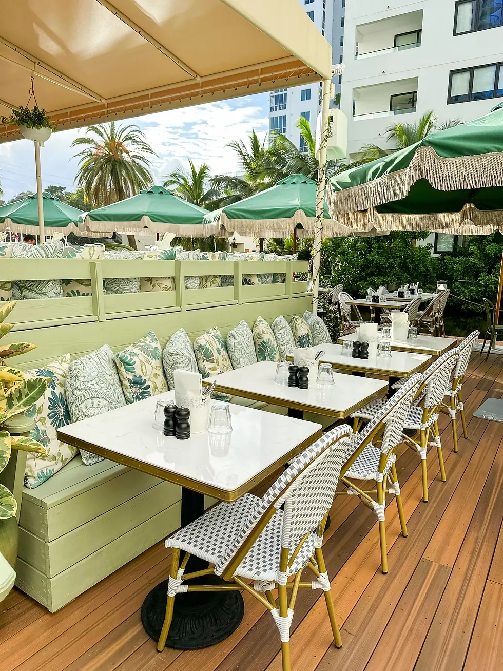 Cozy seating at Café Bastille, offering the perfect spot for enjoying the best brunch in Fort Lauderdale