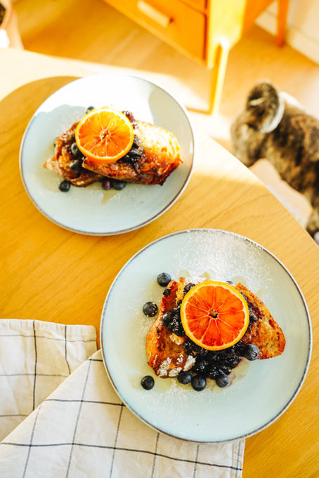serving vegan london fog french toast with a blueberry, date, cardamom compote