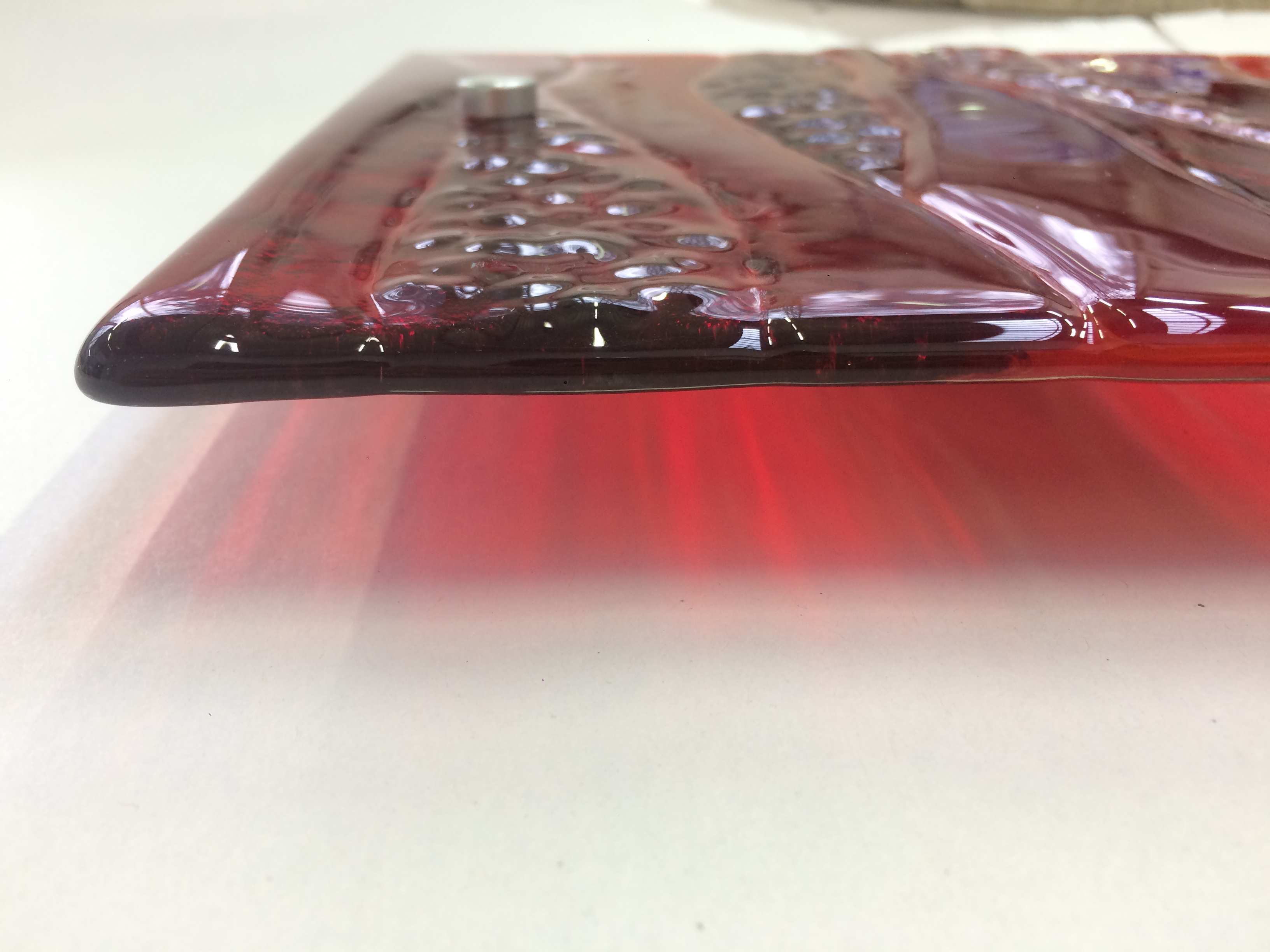 Fading glass wall panel.