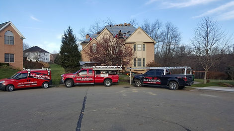 Youngstown Roofing trucks
