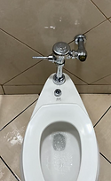 A close-up shot of a clogged toilet
