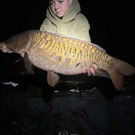 Henri Brown with a 14lb 5oz mirror carp