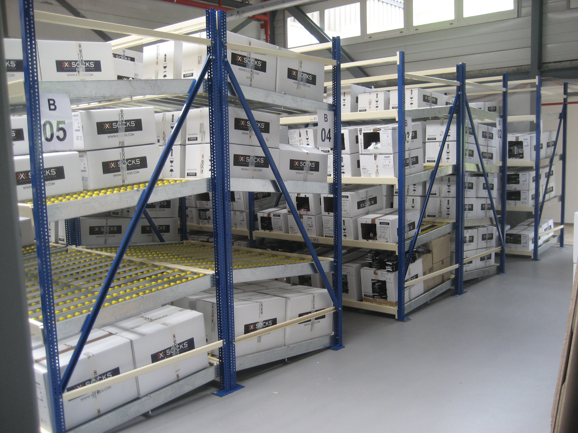 Dynamische Regalsysteme Läderach Lagersysteme