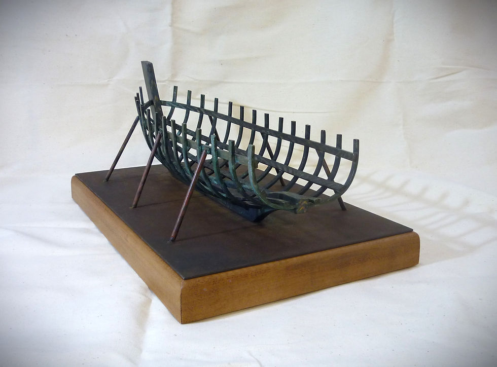 6pm on the seventh day H 250 x W 310 x D 550mm cast  bronze, wood stainlesss steel 2025