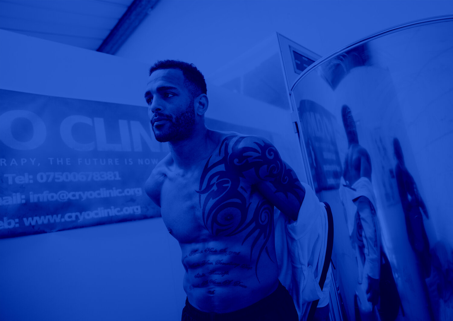Athlete stepping into CryoClinic's cryotherapy chamber, Wirral