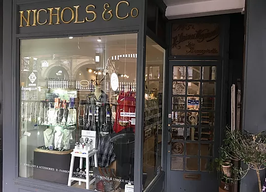NICHOLS & Co shopfront displaying accessories and merchandise in window.