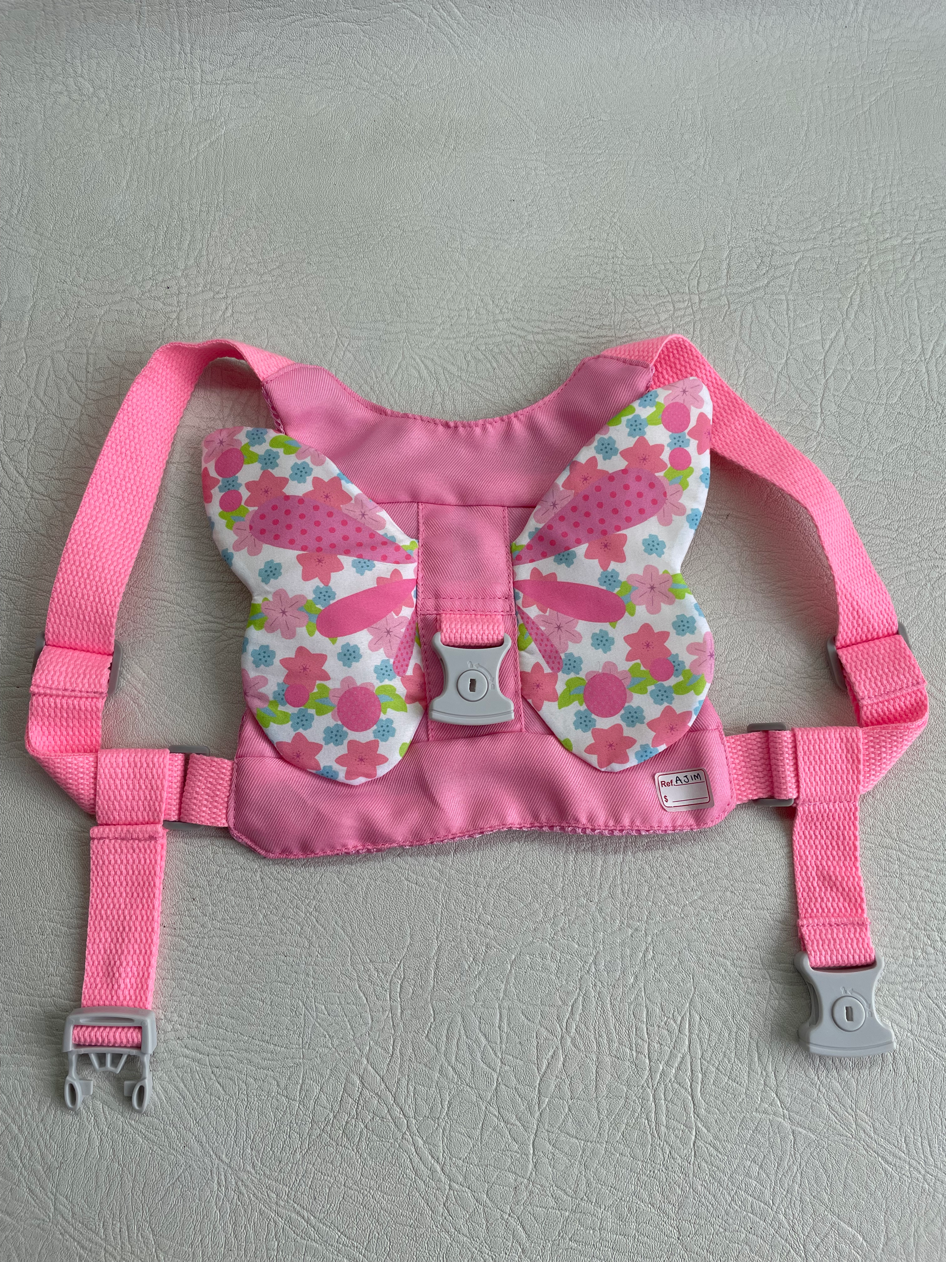 Arnés mariposa para niña