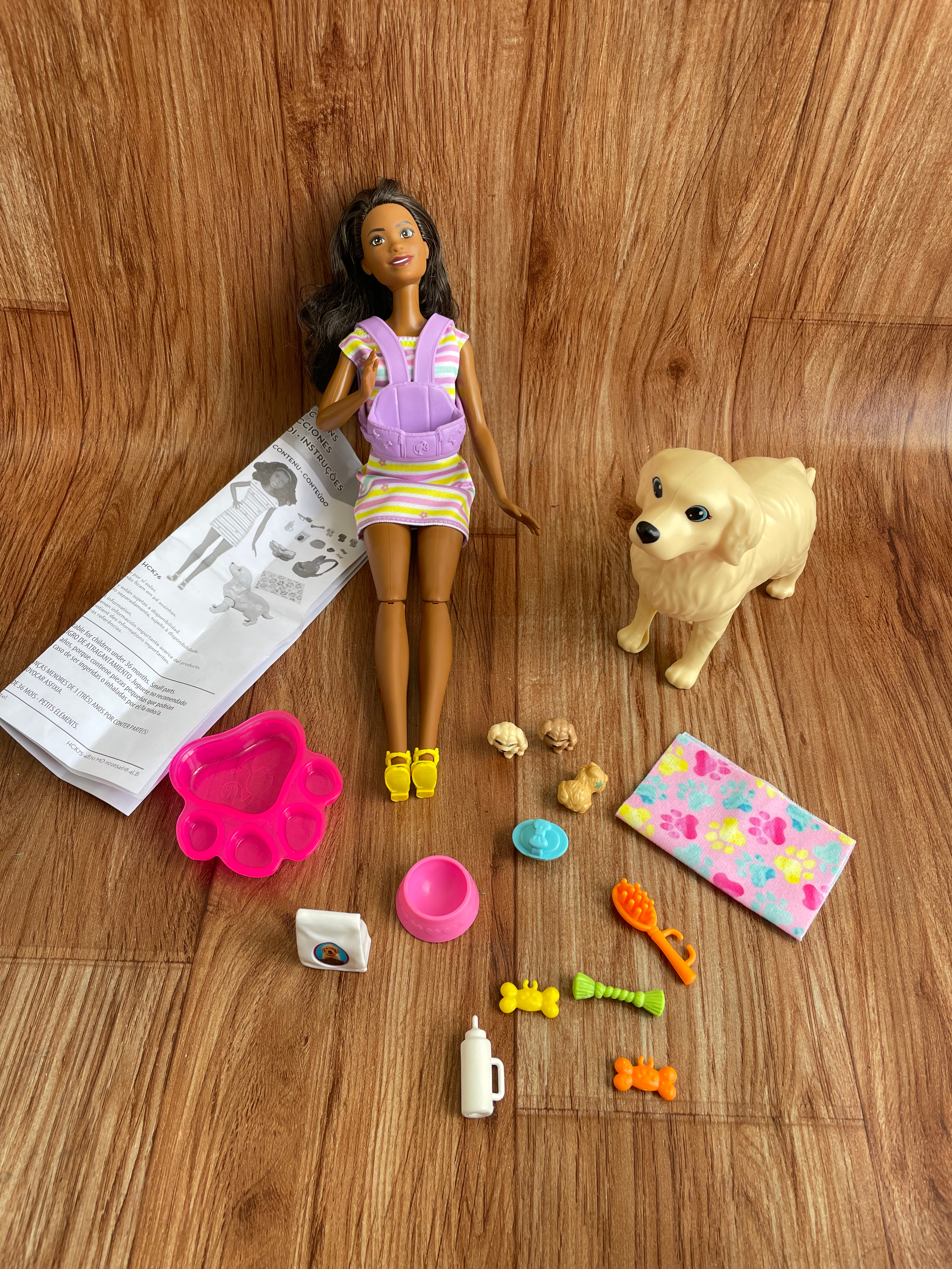 Barbie con accesorios incluye perrita y cachorritos