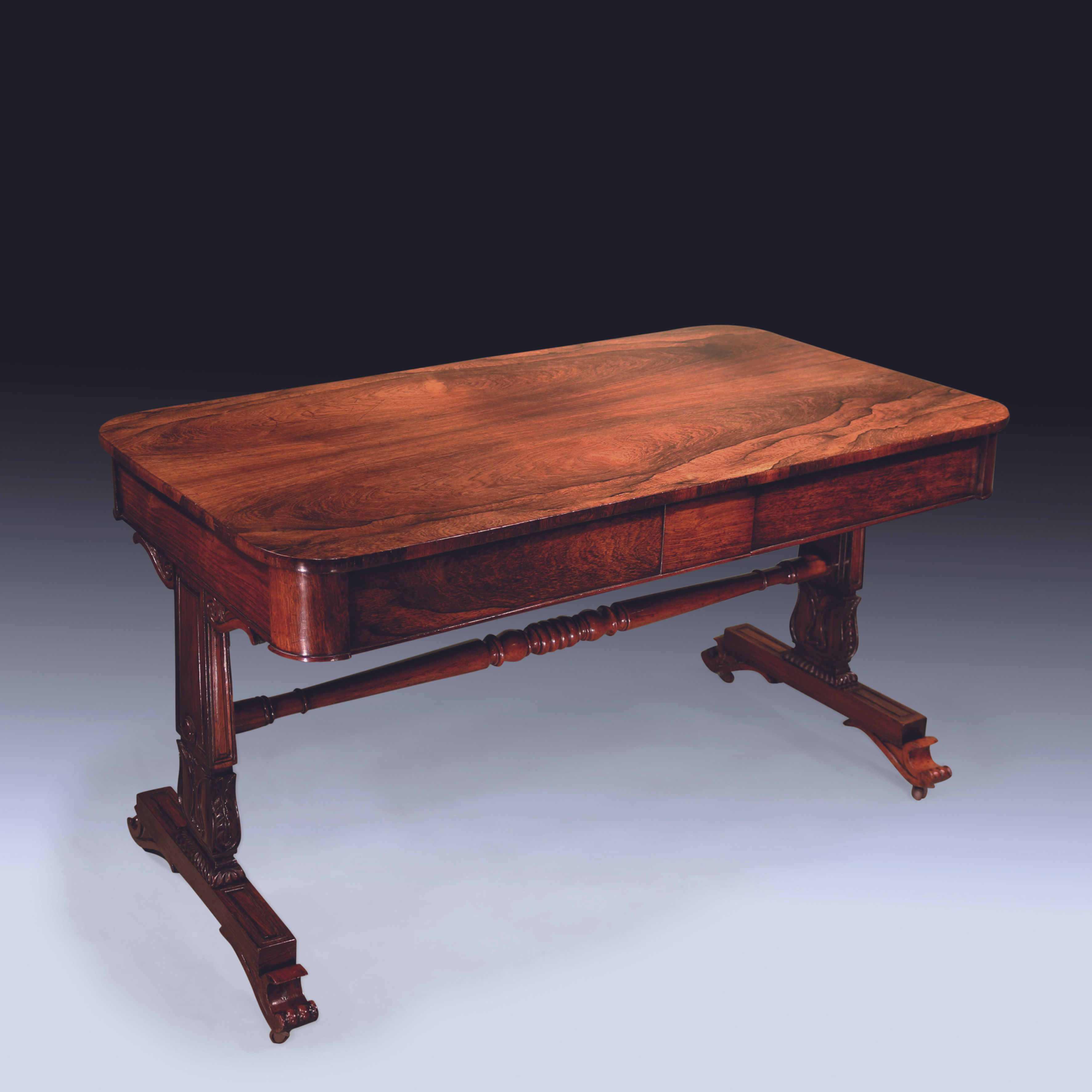 Early 19th Century Regency period well figured rosewood Writing Table.