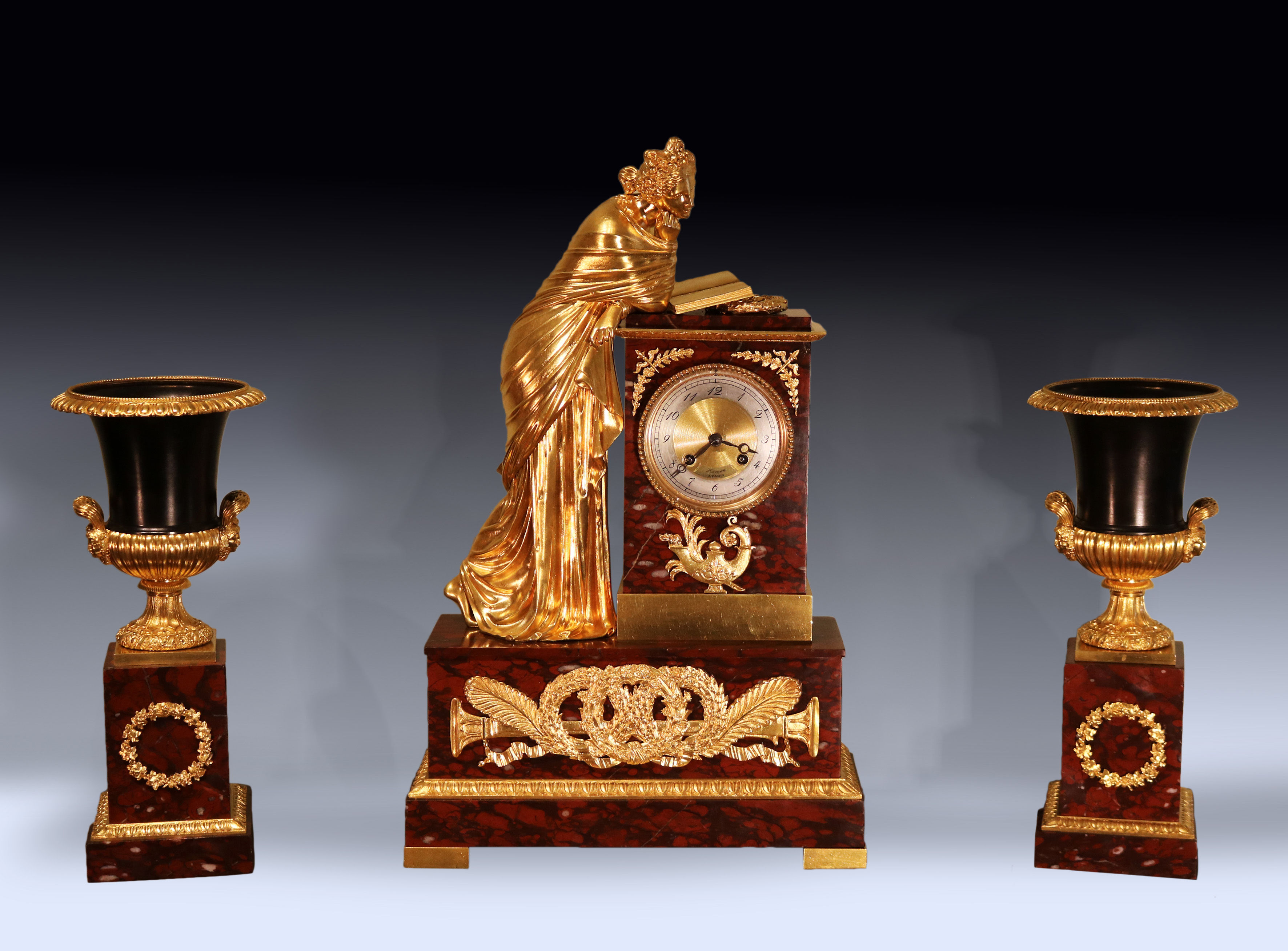 Antique early 19th century French red marble and ormolu clock garniture