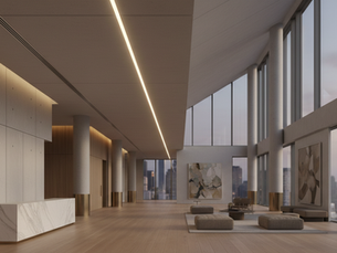 Eye-level view of a sleek modern linear LED luminaire installed in a commercial space