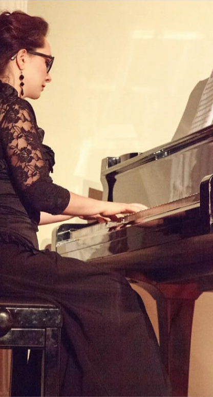 Piano teacher ready for next piano lesson