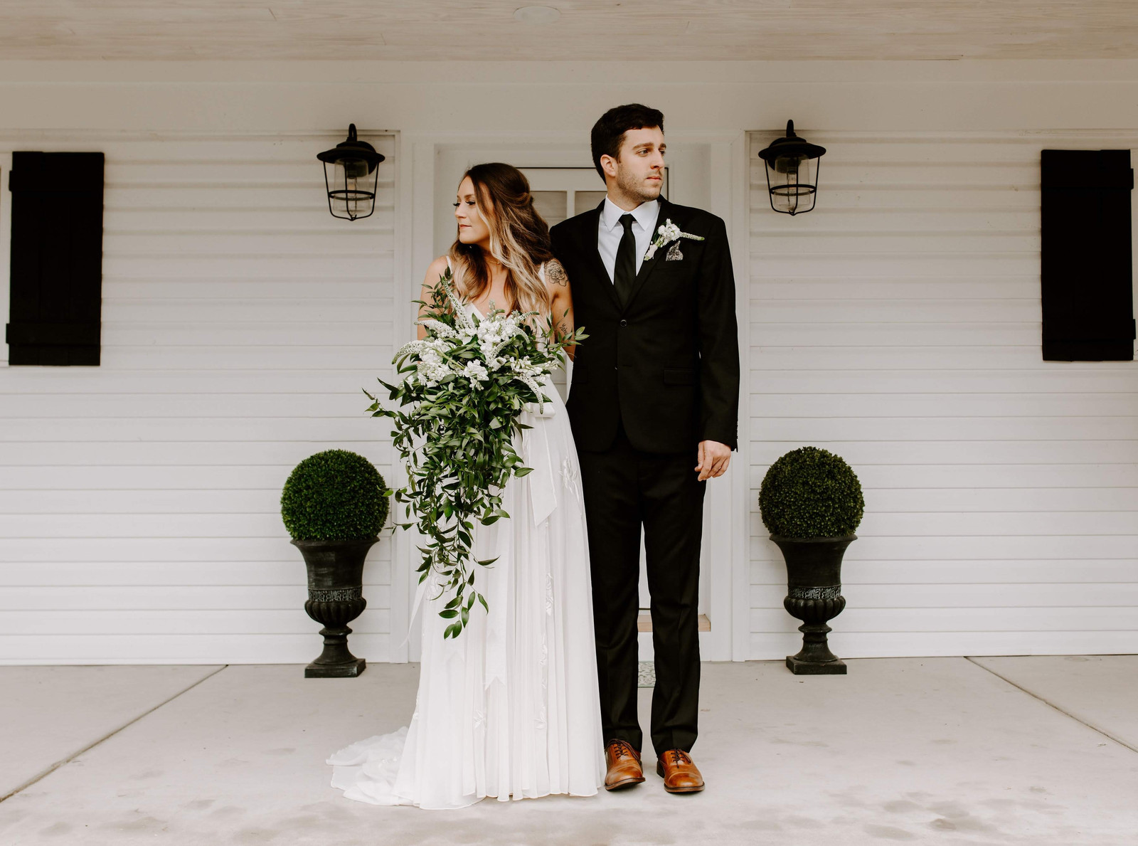 Couple on the Bethany Cottage Front Porch