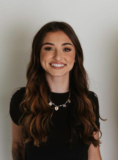 logan headshot_edited.jpg