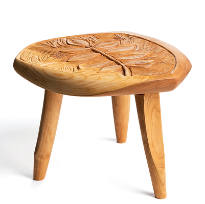 Hand-carved cherry stool with sculptural legs