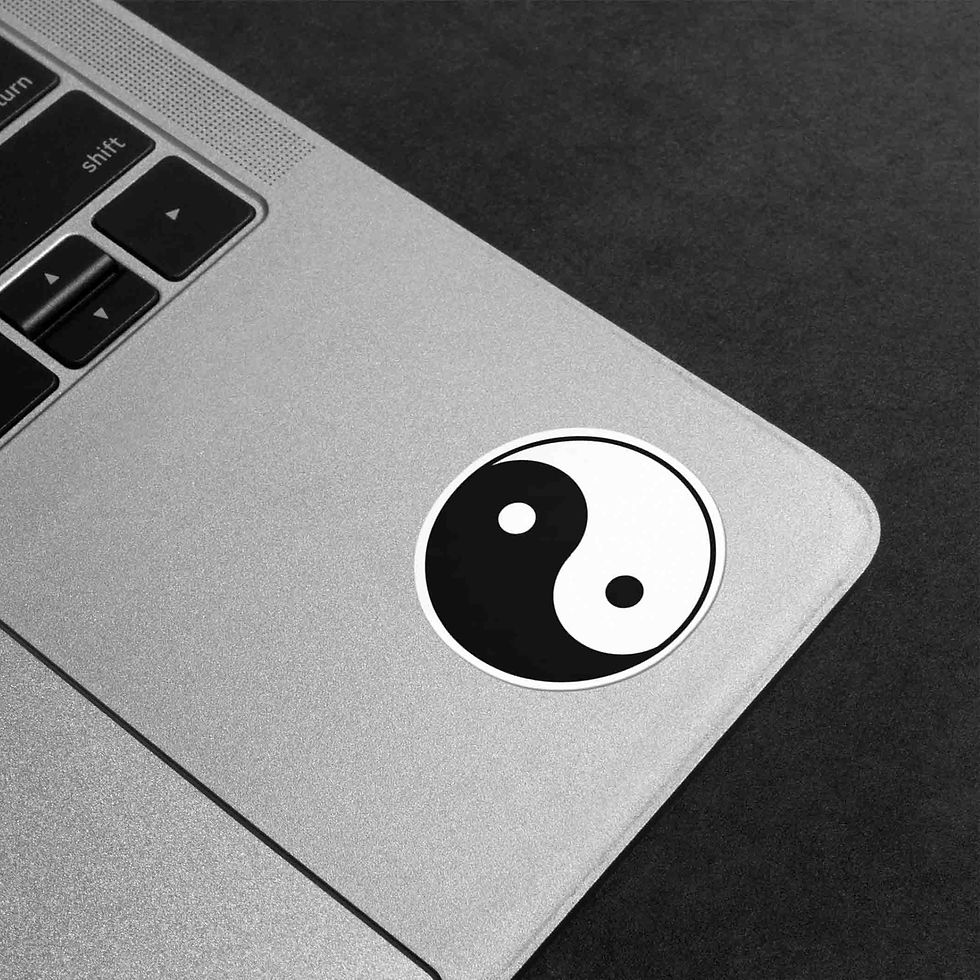 Thumbnail: yin yang sticker on laptop closeup