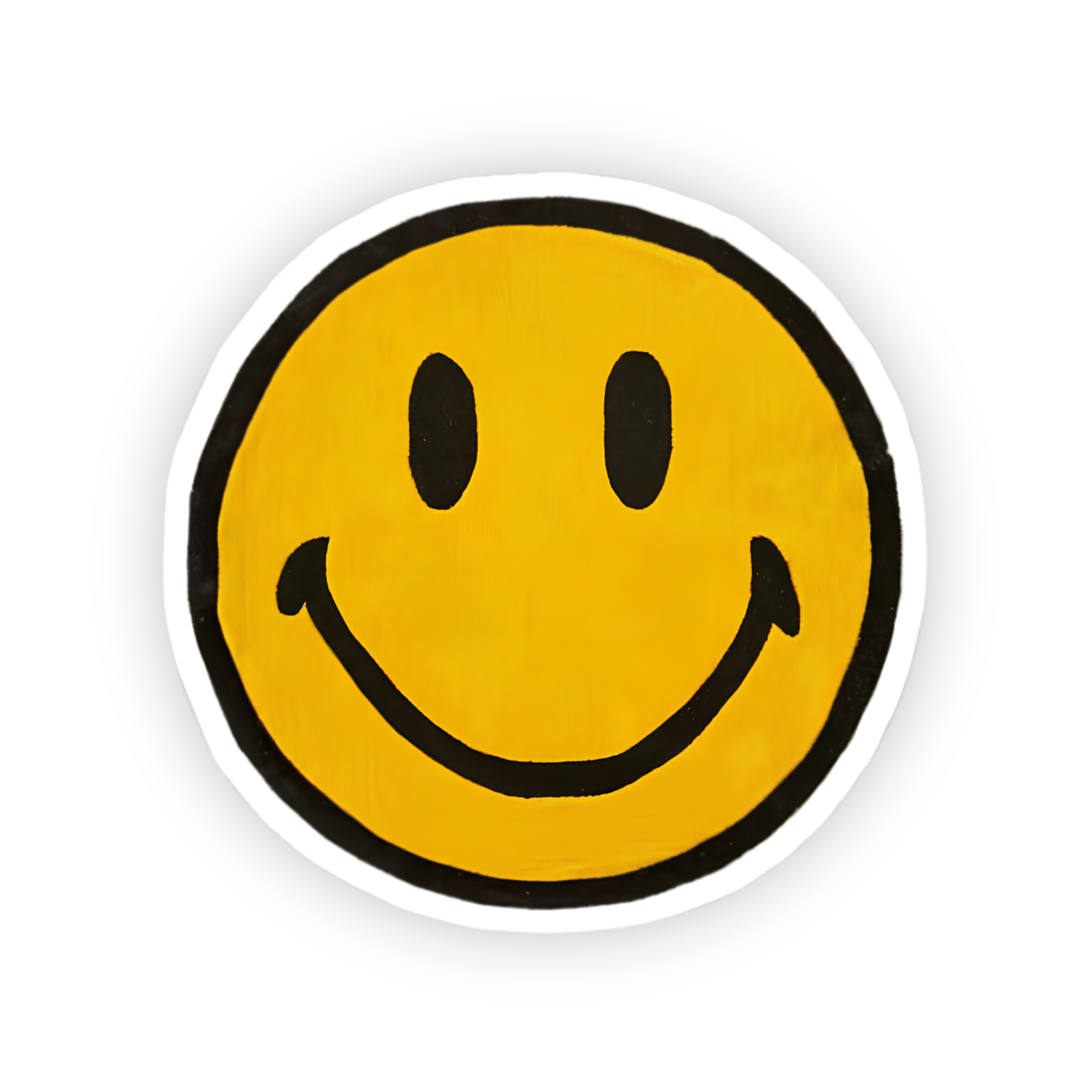Cute smiley vinyl sticker on silver laptop