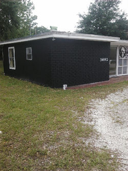 jmp painting black building done side.jpg