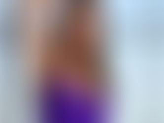 Model Tanya Tate in a spicy purple top
