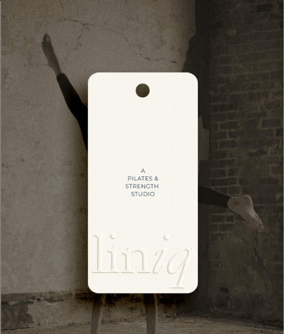 Pilates brand identity mockup on white tag over fitness photogram