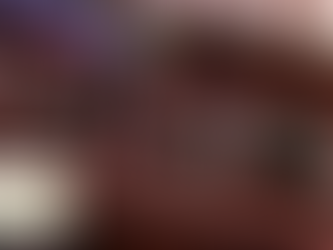 A crowded auditorium with the Runnymede Business Awards logo in the bottom left corner.