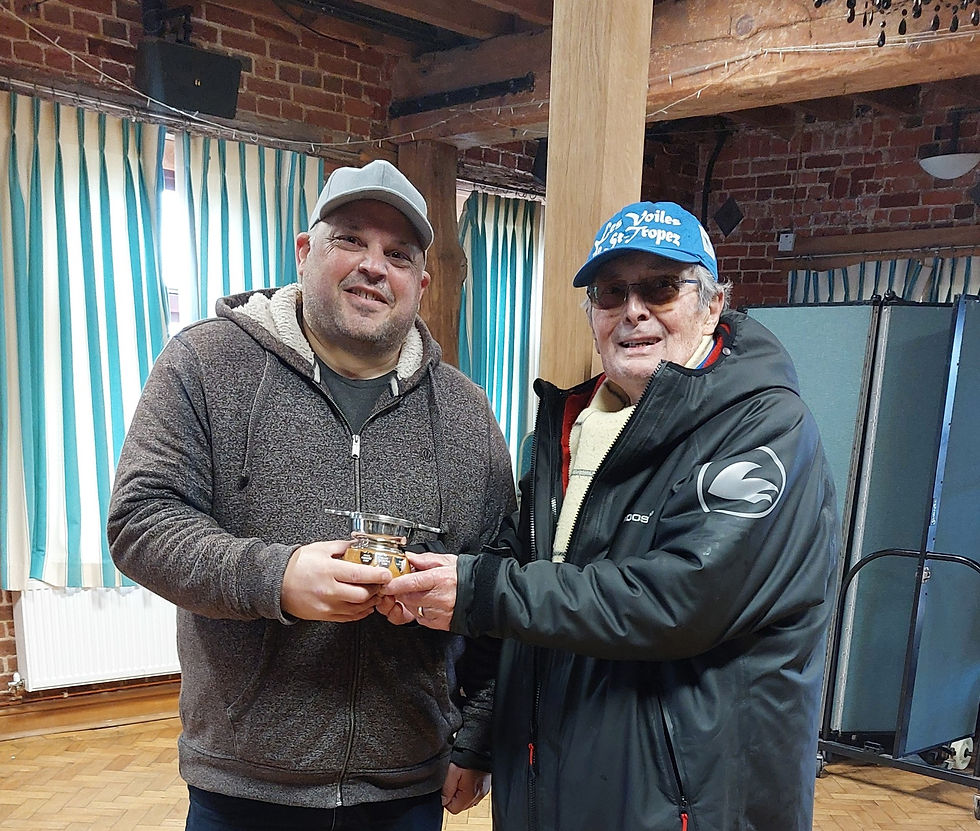 Clive (left) seen here receiving the silver Quaich from Peter Hankey