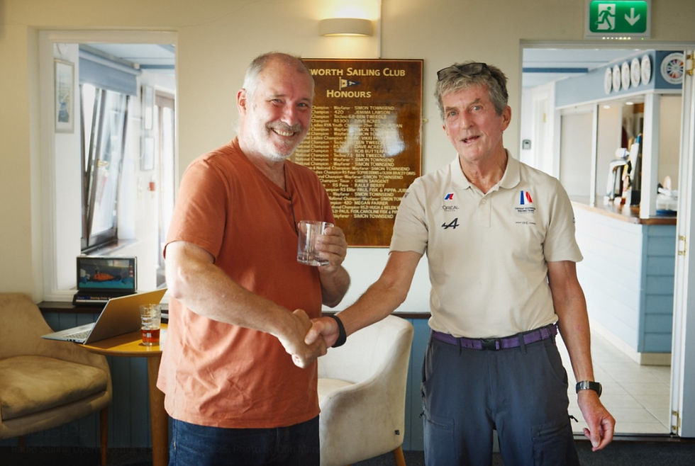 Simon receiving his Ist place prize (empty?) glass from Jeremy White