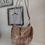 Thumbnail: The Tassel Buckle Bag - Beige
