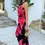 Thumbnail: Black And Coral Red Floral Print One Shoulder O-Ring Midi Dress