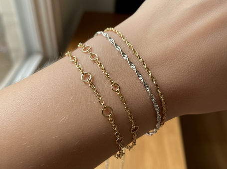 Permanent jewelry on wrist.jpg