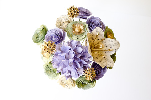 bridesmaid paper bouquet made from church hymnal pages in lilac, sage and ivory