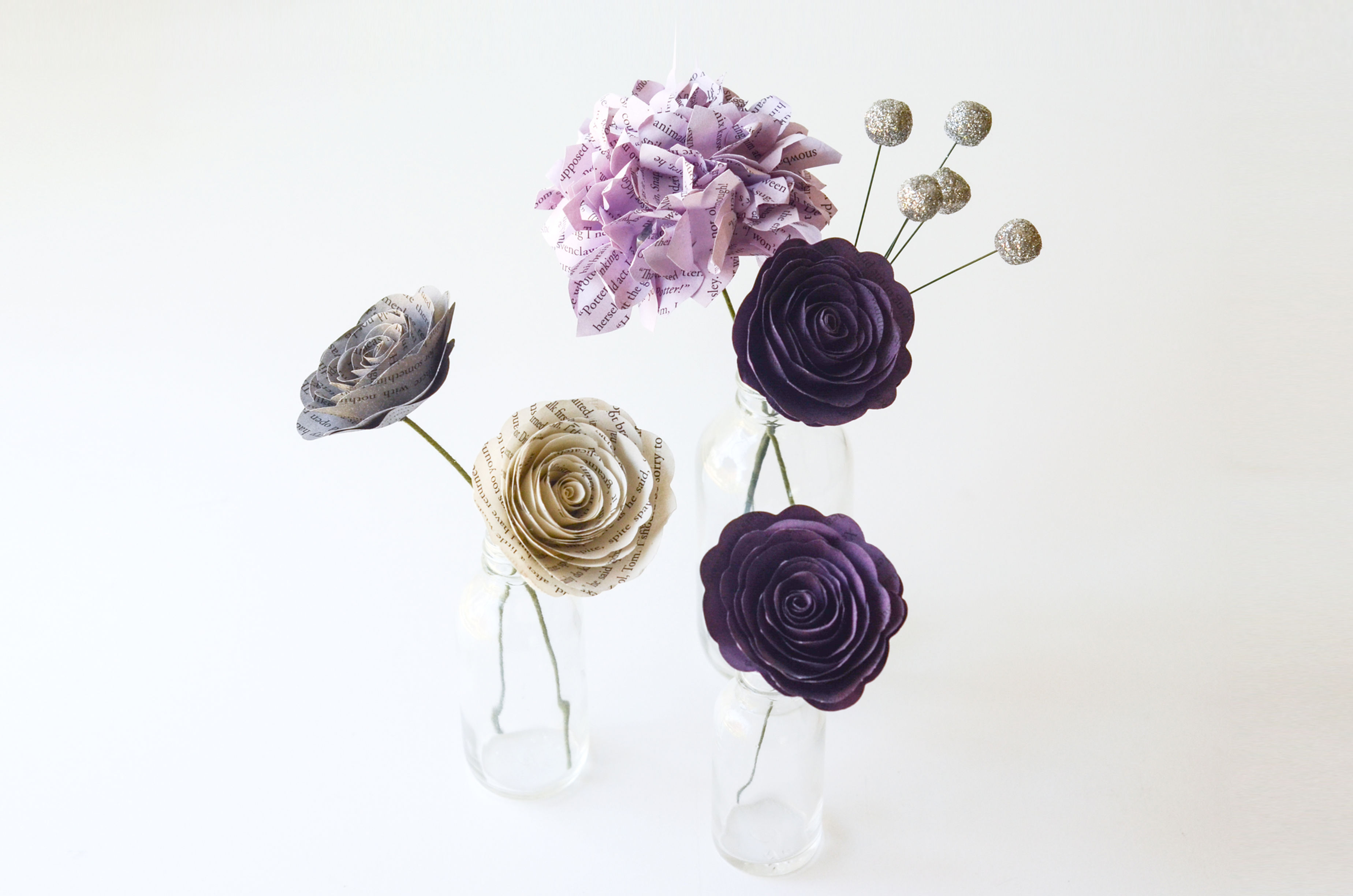 Hydrangea and rose book page centerpiece for wedding decor, and guest favors