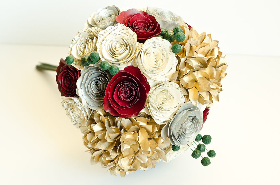 Literary and Christmas color themed bridal bouquet handmade from Harry Potter book pages in crimson, ivory and hunter green