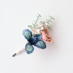 book page groom's boutonniere for a literary wedding