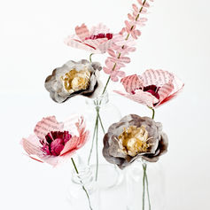 Paper flower arrangement, with anemones, poppies and daisies made from book pages
