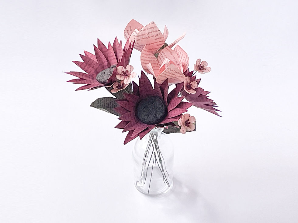 wine red sunflowers and blush pink magnolias floral bouquet made from books