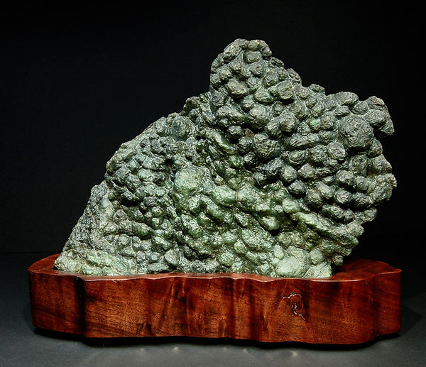 Botryoidal Jade Stone atop a custom handmade wooden base by Troy Burns