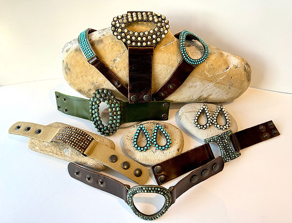 Urban, edgy, gritty arm-ware with turquoise, African jasper, mother of Pearl, or picture jasper with sturdy leather bands. Powerful and stylish!