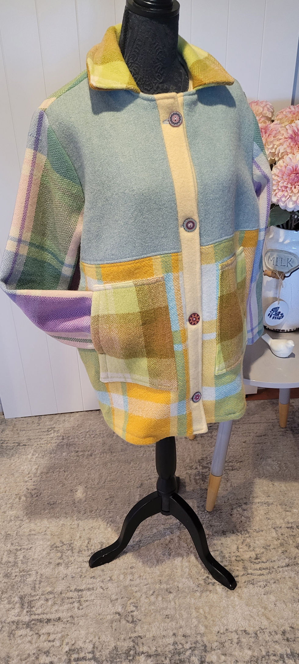 Margot Coat in medium showing patchwork plaid patterns.